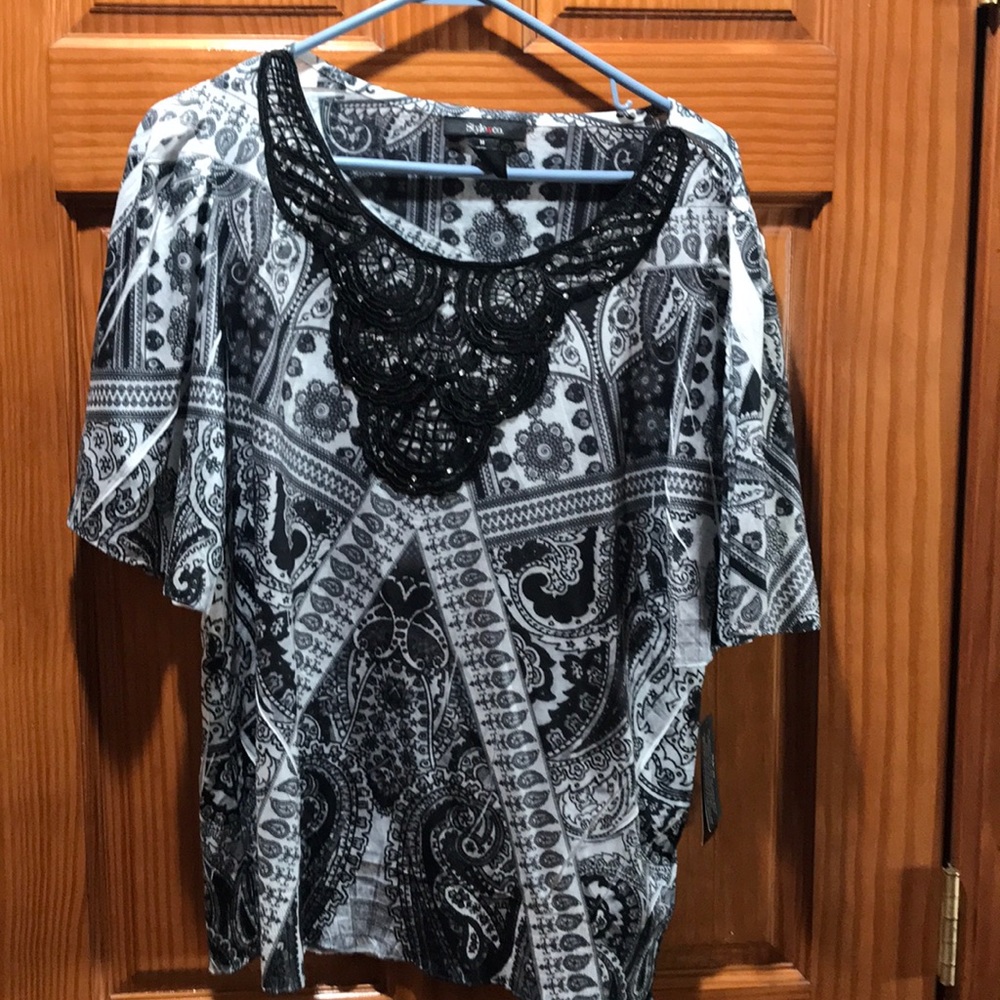 Black and gray blouse.